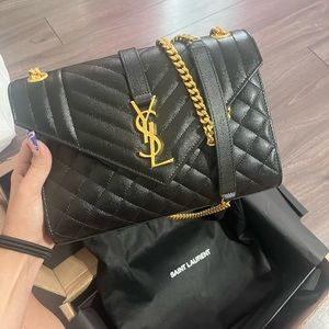 YSL ENVELOPE MEDIUM IN QUILTED GRAIN DE POUDRE EMBOSSED LEATHER